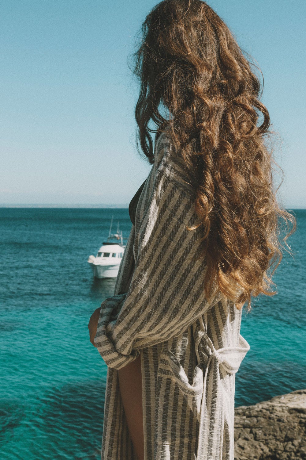 anna alexandra enjoying the view with striped grey robe