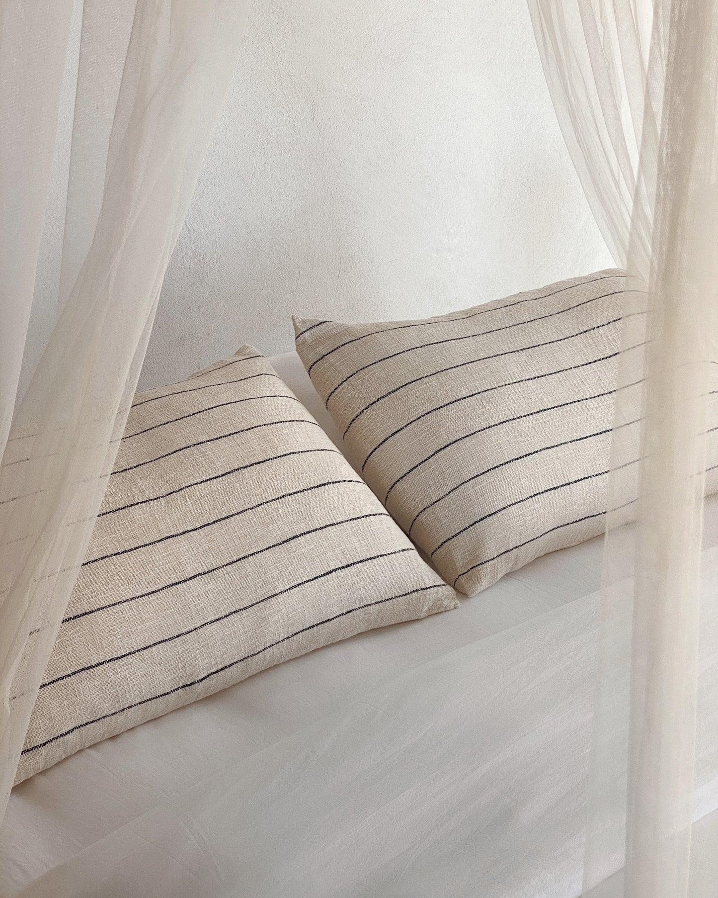 Bianco Bedding & Suro Cushions