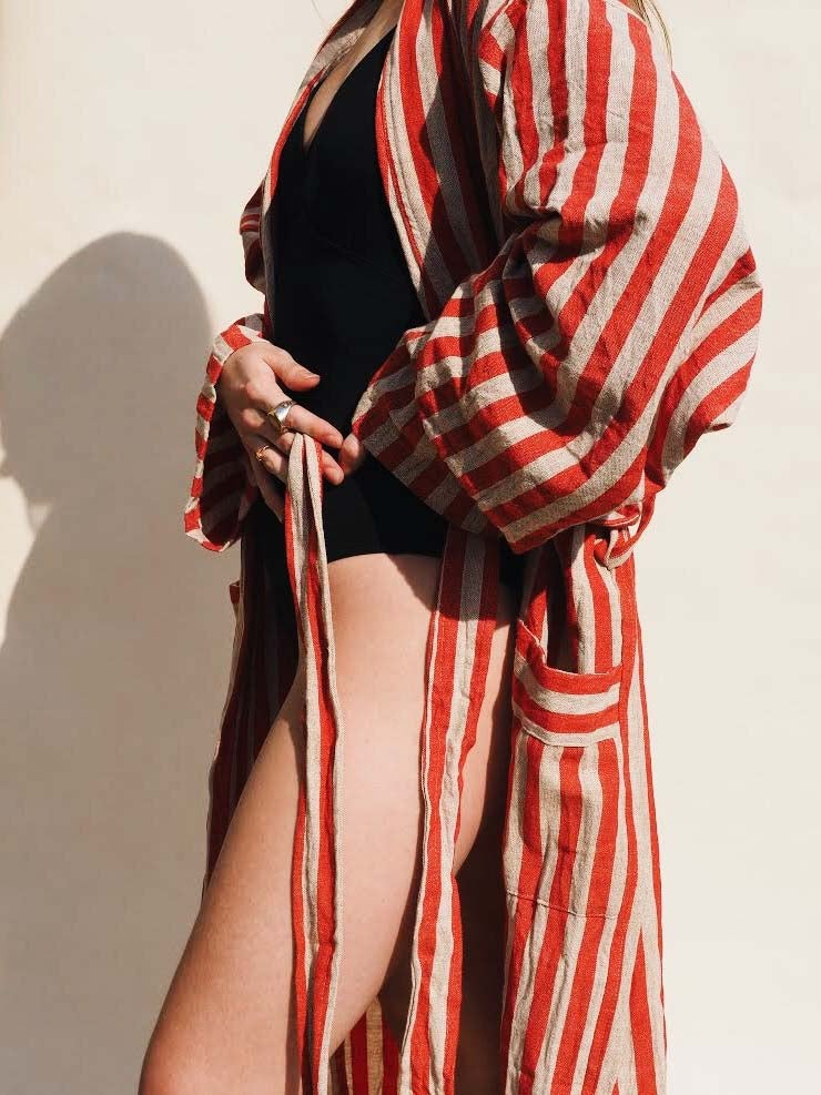 keyla in studio with striped red robe