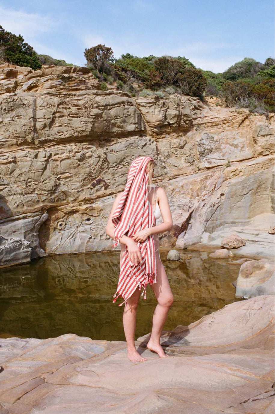 siva wrapped in striped red towel