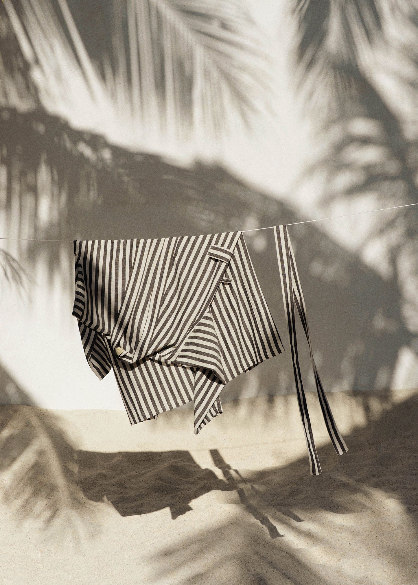 striped black robe hanged in puro island