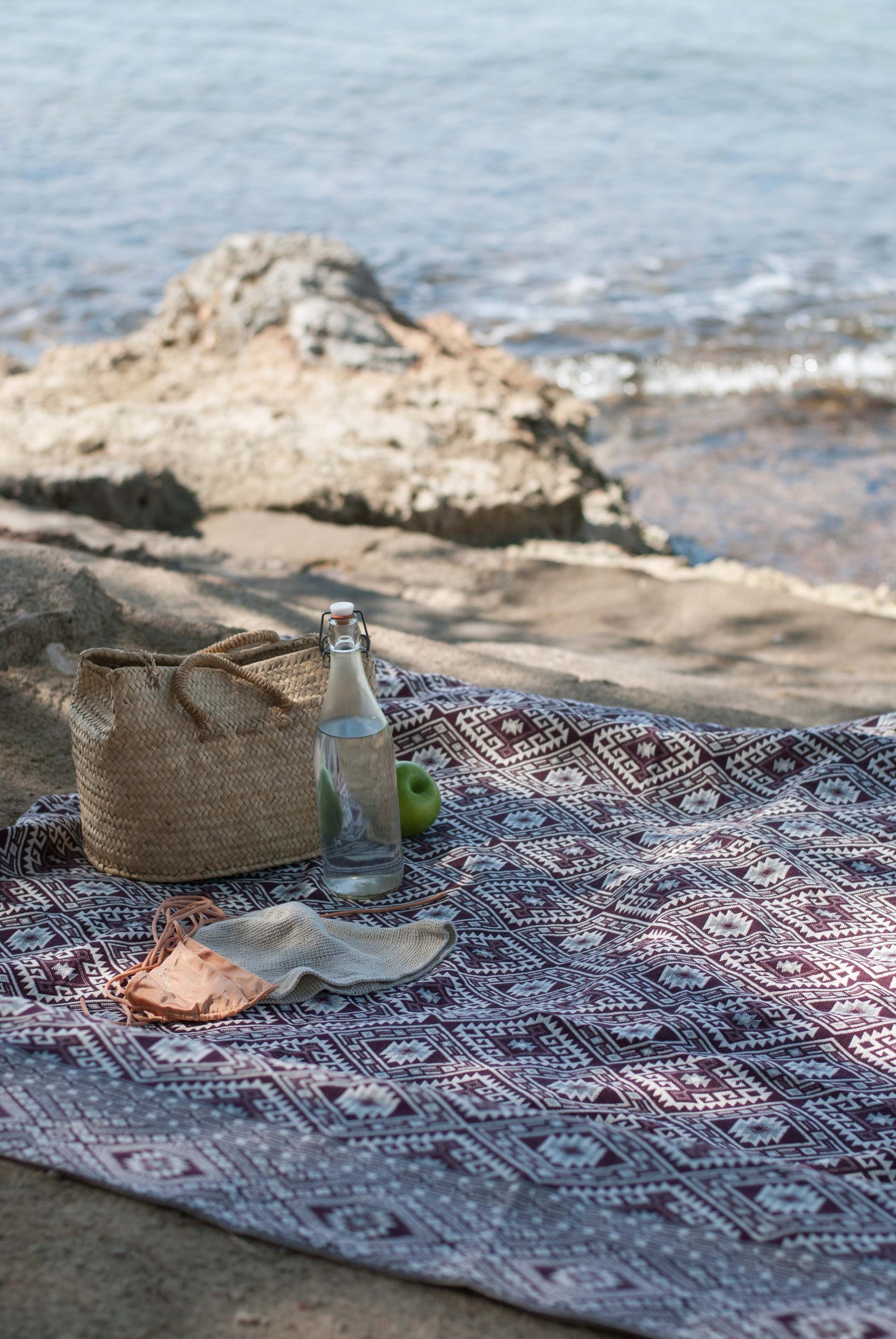 uttu burgundy as a beach blanket