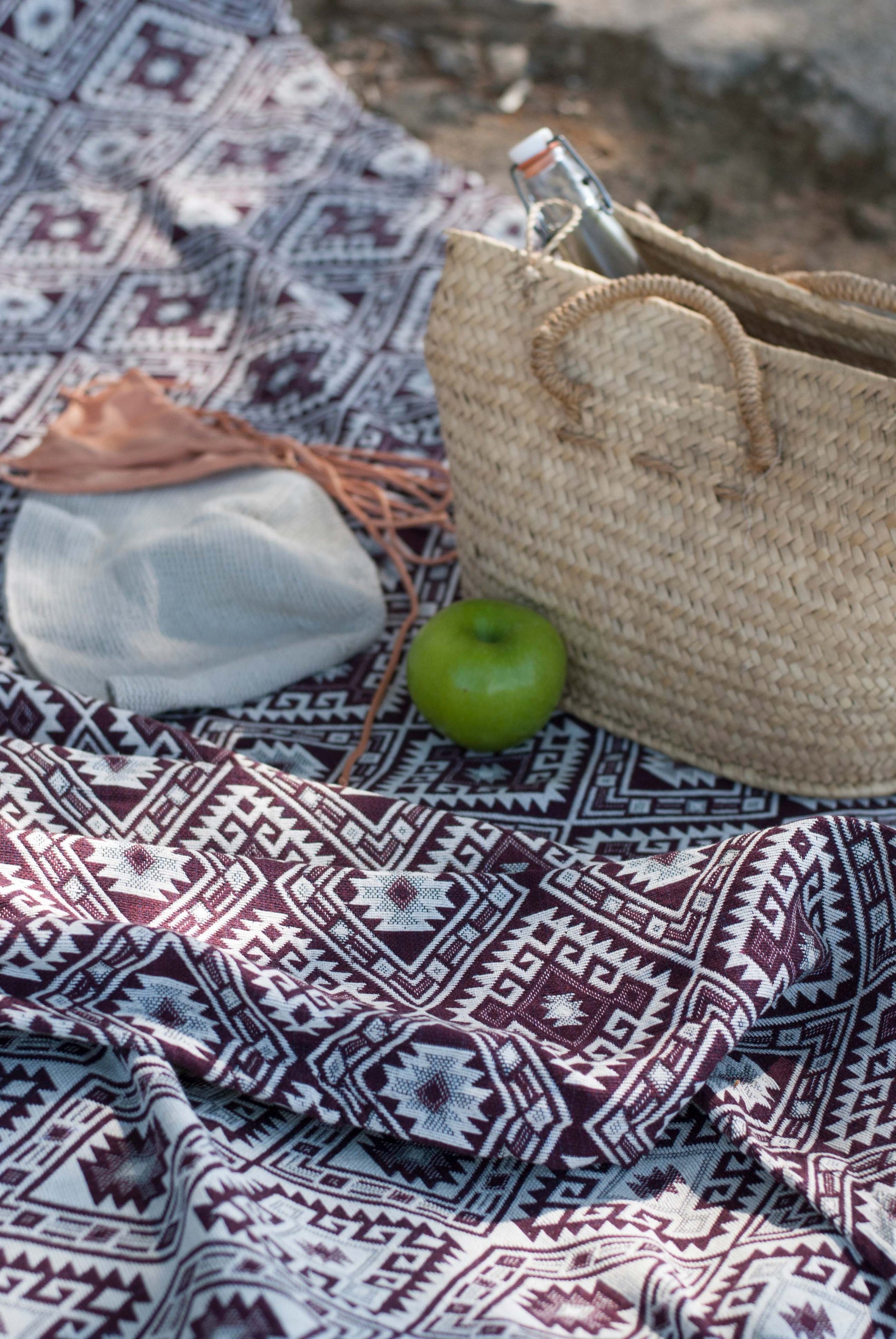 uttu burgundy detail shot at the beach